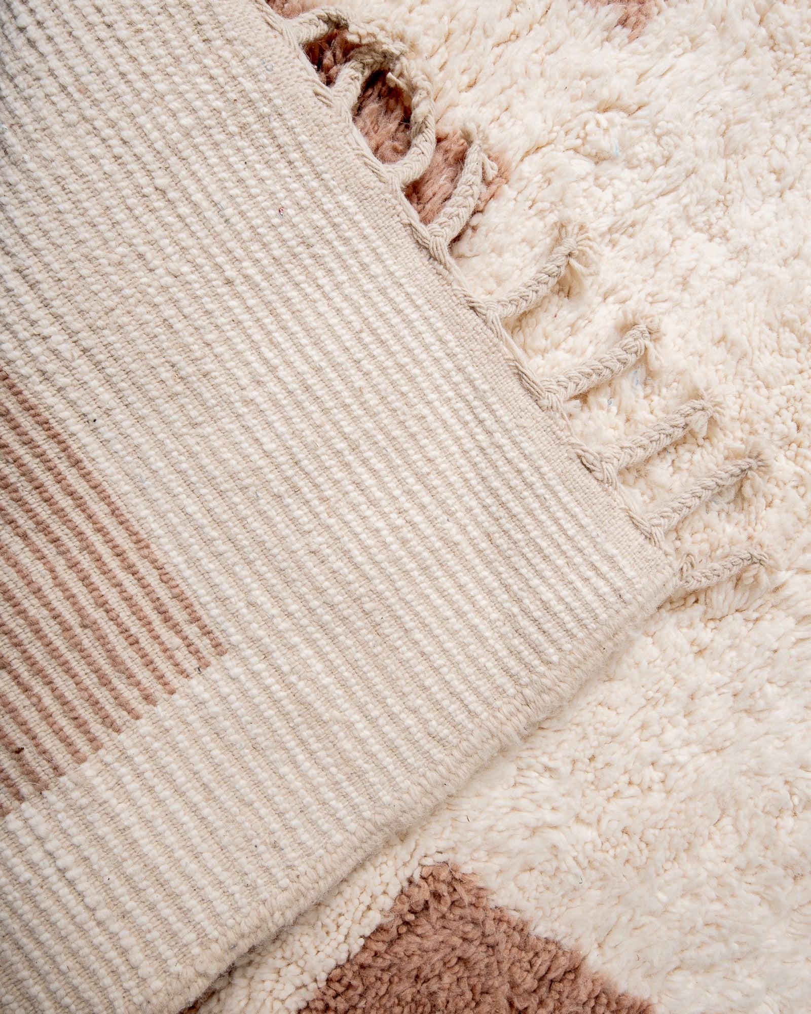 Modern, designer, handcrafted Berber rug from Morocco. Beniourain carpet with beautiful colours and patterns and fluffy wool texture.
